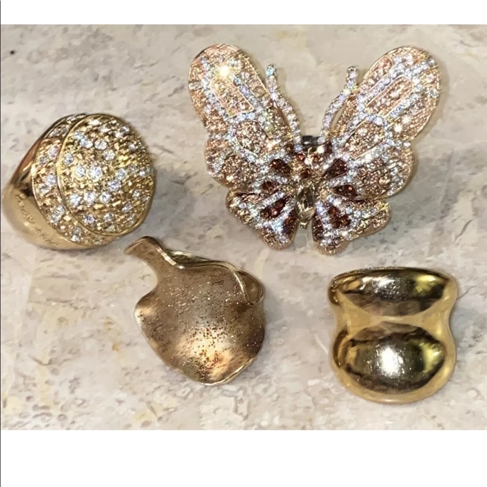 Lot of 4 gold/rhinestone rings (designer included)